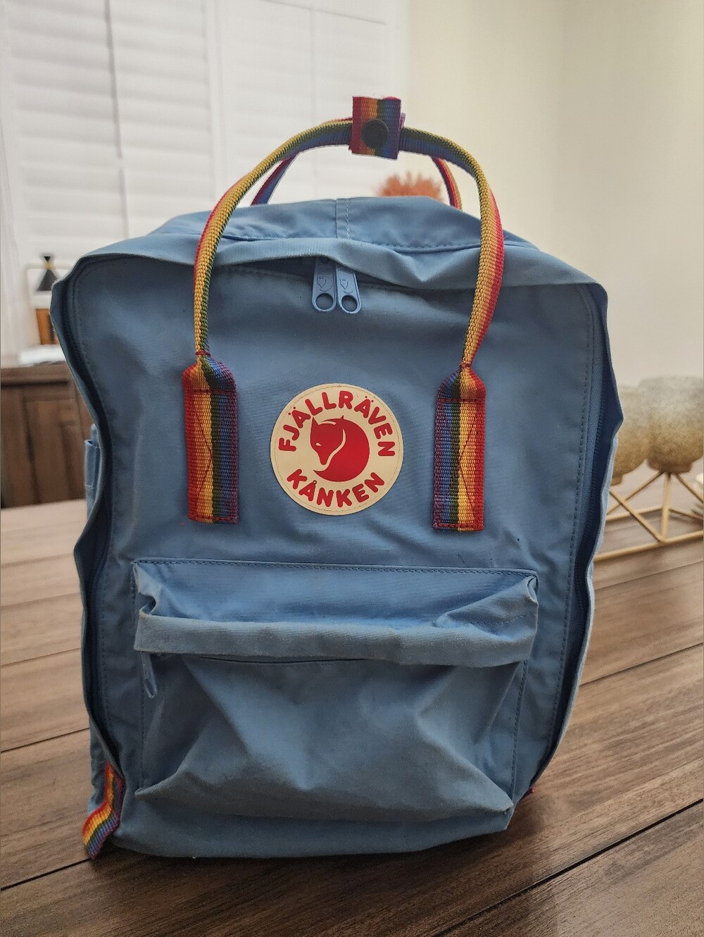 Classic Light Blue Backpack with Rainbow Accents